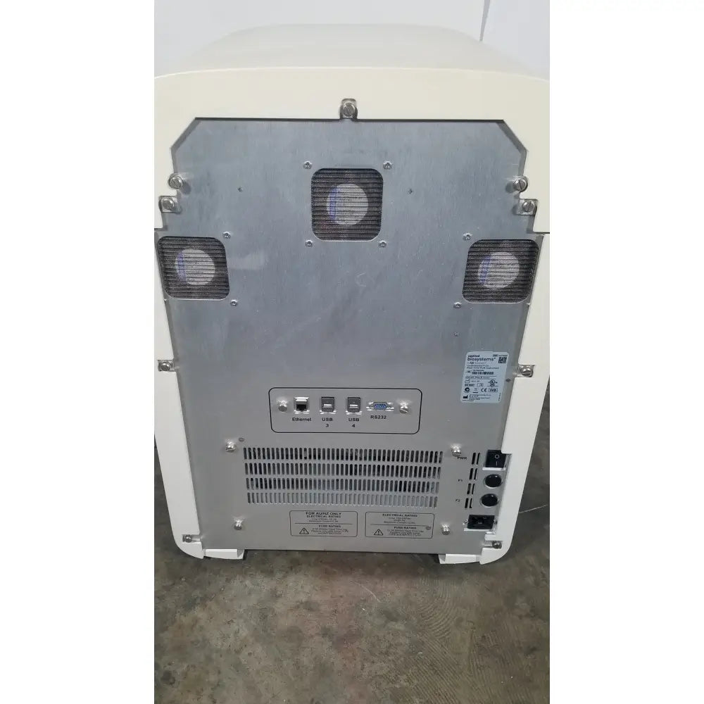 Cream-colored applied biosystems quantstudio dx real-time pcr instrument rear with metallic panel ethernet usb ports and vents