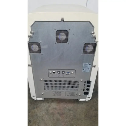 Cream-colored applied biosystems quantstudio dx real-time pcr instrument rear with metallic panel ethernet usb ports and vents