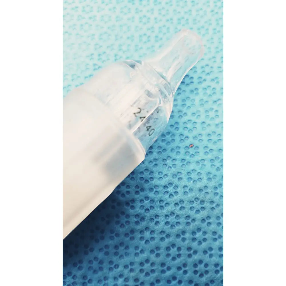 Clear plastic aquarium air pump control valve with measurement markings for precise pump control and air flow adjustment