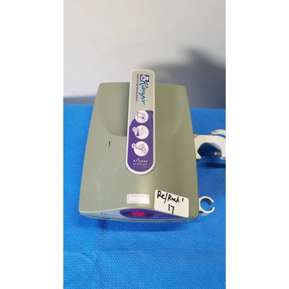 Gray plastic airtight arizant healthcare ranger device with purple and white label for healthcare ranger blood and fluid warming systems