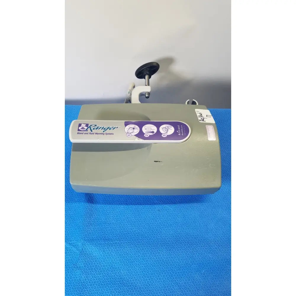 Gray plastic arizant healthcare ranger blood and fluid warming system with purple label for medical fluid warming use