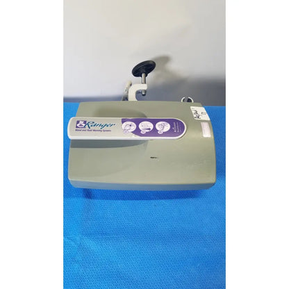 Gray plastic arizant healthcare ranger blood and fluid warming system with purple label for medical fluid warming use