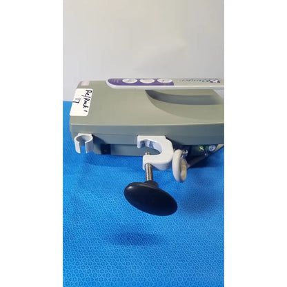 Gray medical device with white clamp black knob and purple arizant healthcare ranger branding for fluid warming systems