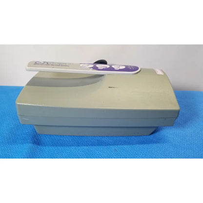 Beige plastic arizant healthcare ranger blood and fluid warming system model 245 with purple and white control panel