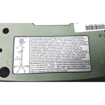 Medical device label with multilingual instructions and iv stand diagram on the back of arizant healthcare ranger blood fluid warmer unit 41 °C model 245