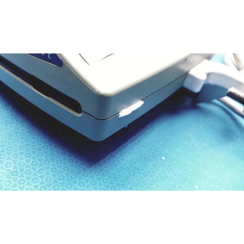 Gray plastic cash register with blue label on top left corner for arizant healthcare ranger blood fluid warmer unit 41 °c