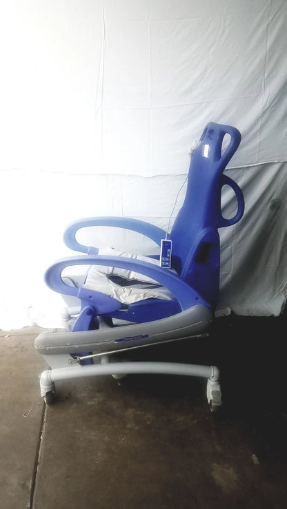 Blue and gray adjustable pediatric multipurpose hygiene chair with wheels by arjo carendo for versatile care