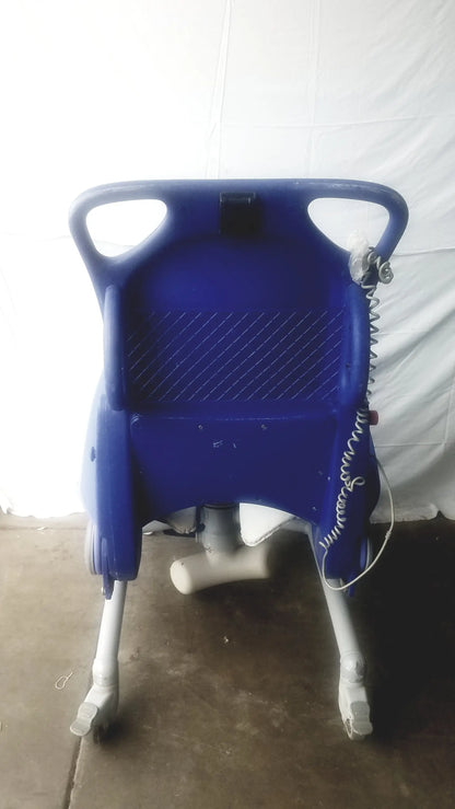 Blue plastic arjo carendo multipurpose hygiene chair with white legs and coiled cable for versatile hygiene use