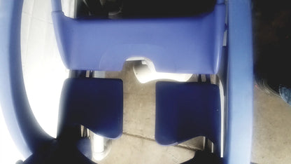 Blue plastic multipurpose hygiene chair with padded seating area by Arjo Carendo for child safety use