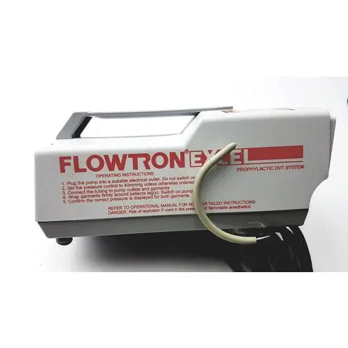 White plastic arjo huntleigh flowtron excel dvt system with red lettering and beige coiled tube attached model ac 550