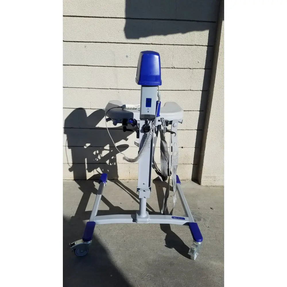 Blue and gray arjo huntleigh power electric walker lift with adjustable height and wheels for patient mobility support