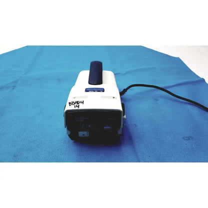 White and black handheld seal machine with blue label and dark handle for arjohuntleigh flowtron excel dvt pump model 247001