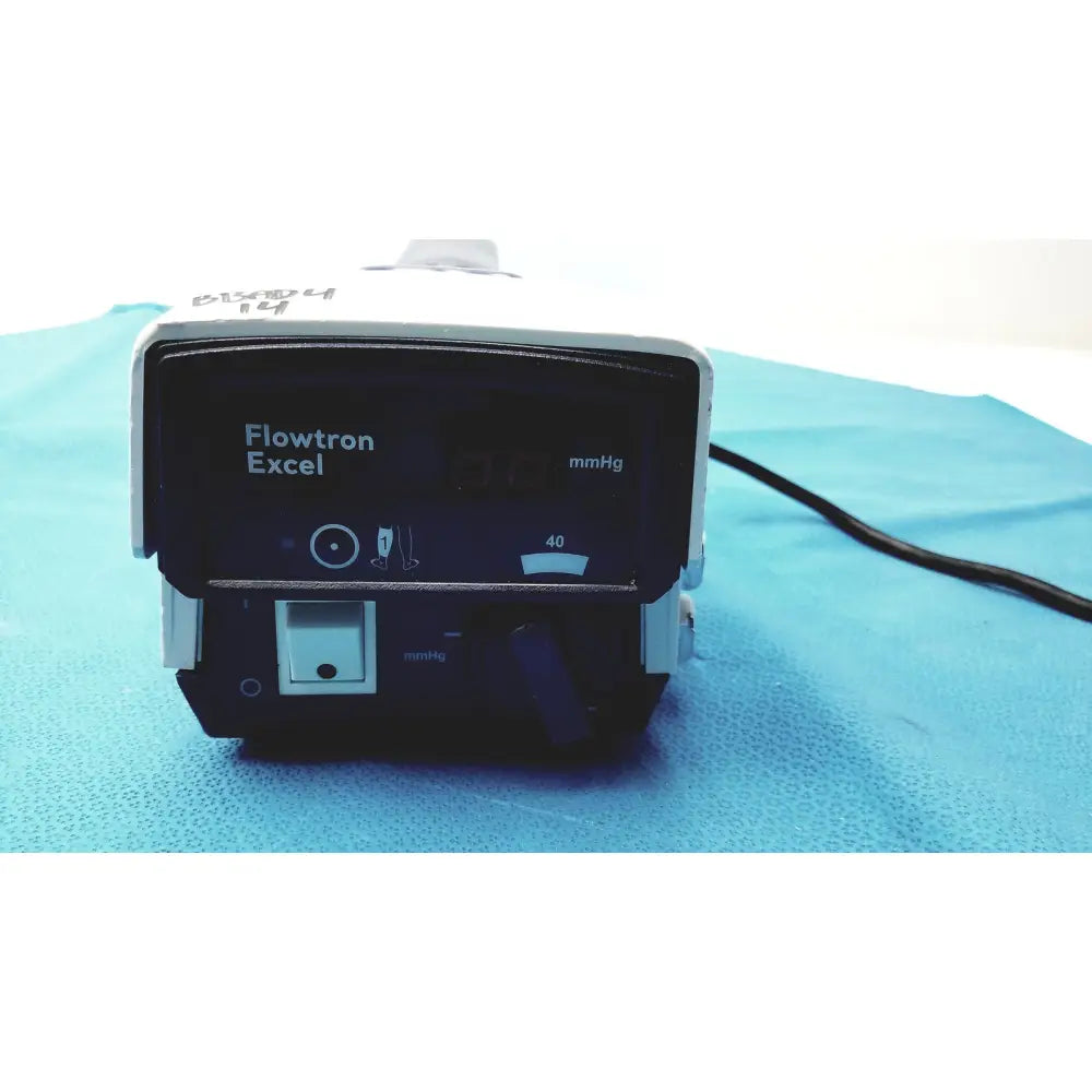 White and black ArjoHuntleigh flowtron excel dvt pump with digital mmhg display model 247001 for medical use