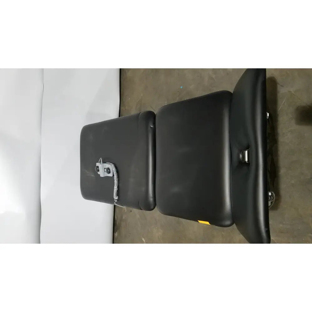 Black padded armedica am-300 three section treatment table with adjustable sections and metal hardware