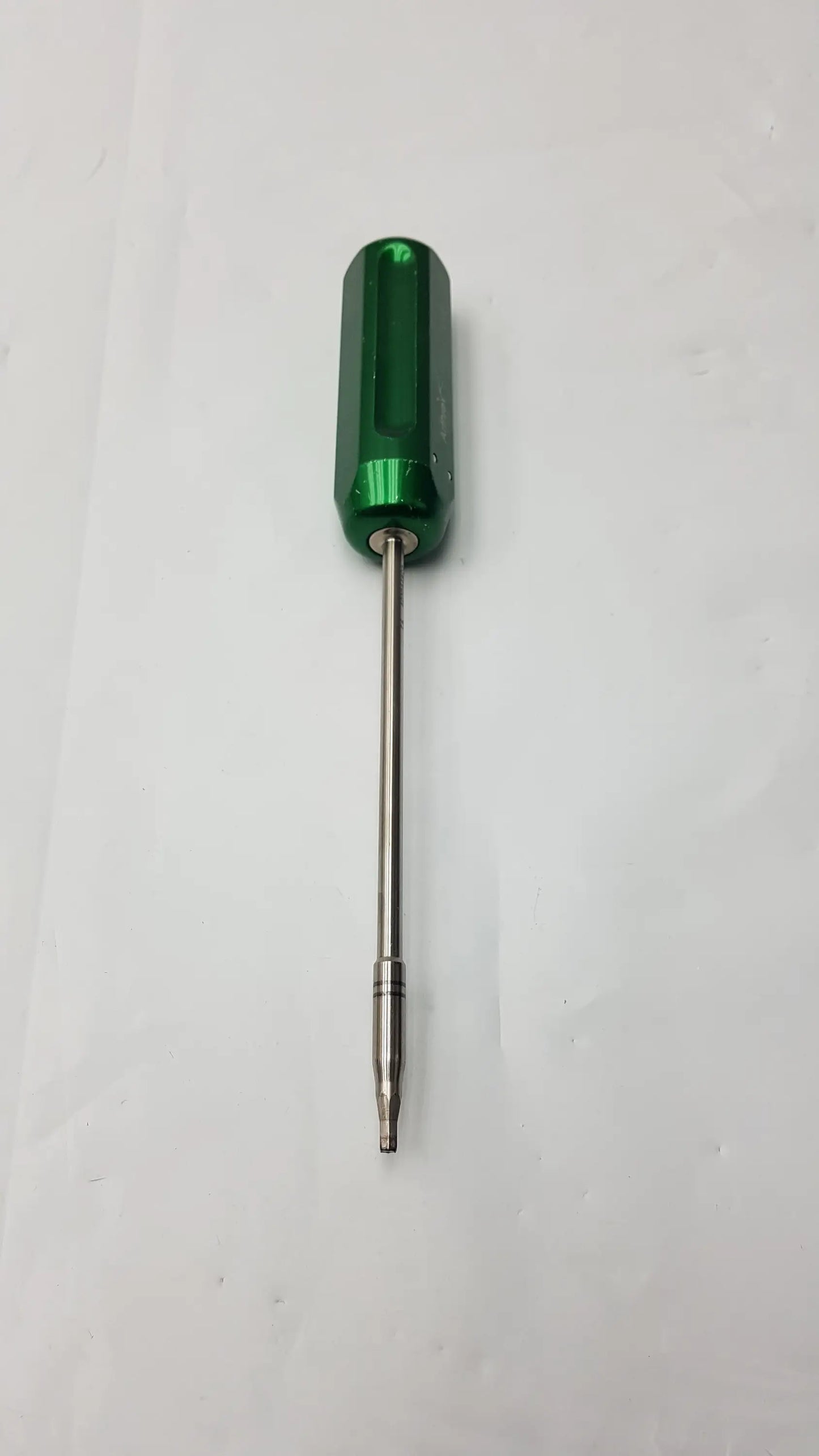 Arthrex AR-13326 green-handled cannulated screwdriver with metallic shaft and pointed tip precision surgical instrument
