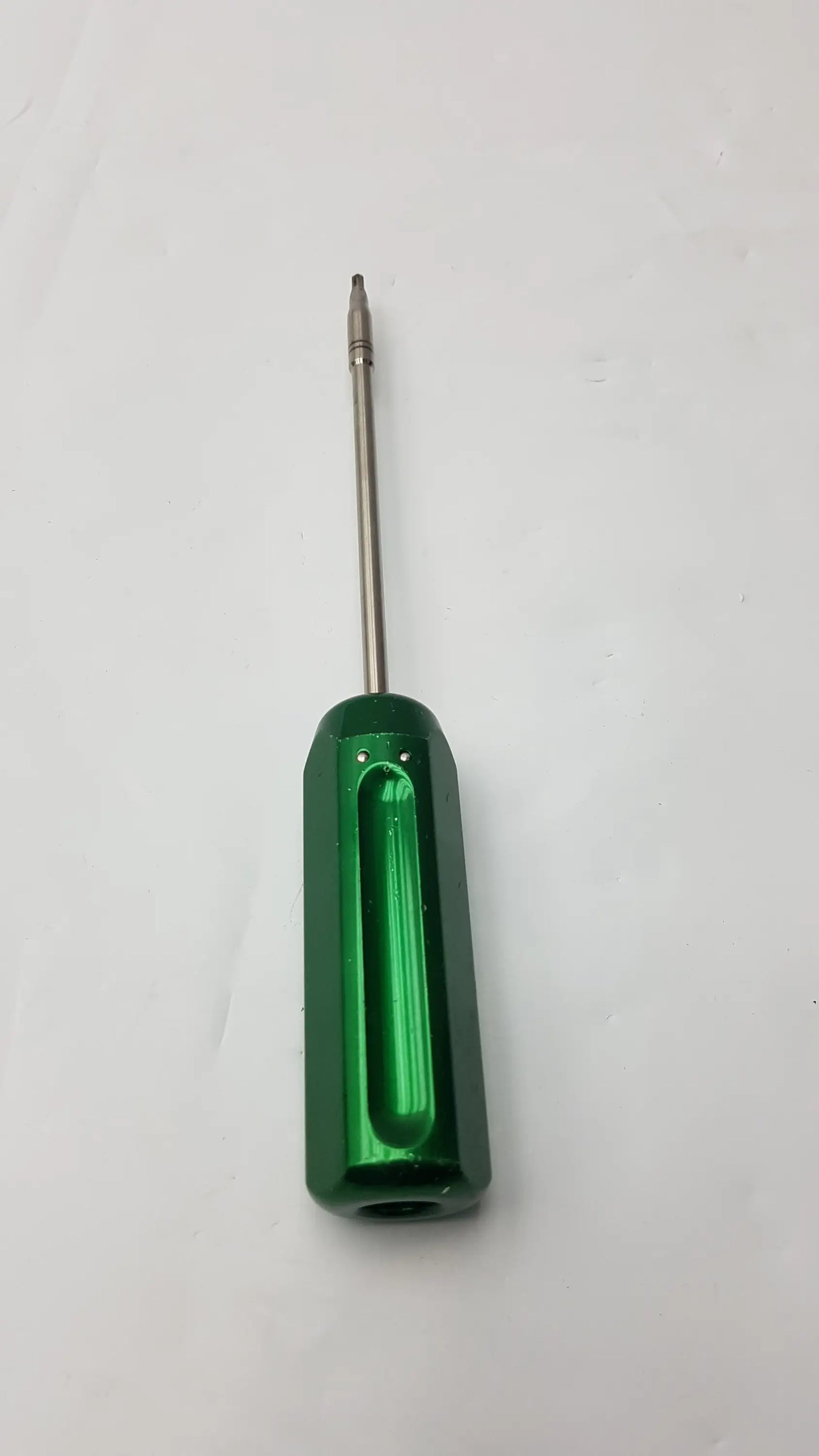 Arthrex AR-13326 green hexagonal-handled cannulated screwdriver with a metallic shaft and precision surgical instrument tip