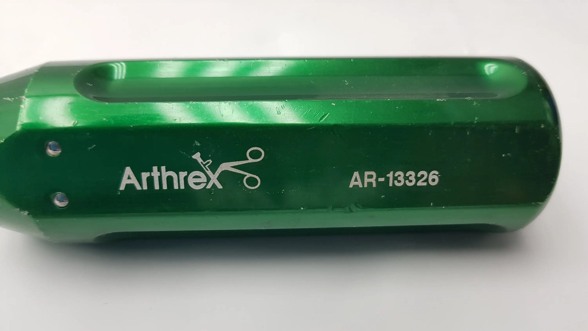 Green metallic Arthrex AR-13326 cannulated screwdriver surgical instrument with engraved branding and sleek cylindrical design