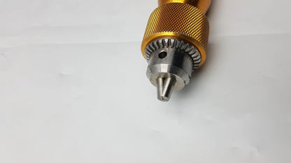 Arthrex ar-1415 gold-colored metal tube driver extractor with textured grip and silver-toned chuck for orthopedic use