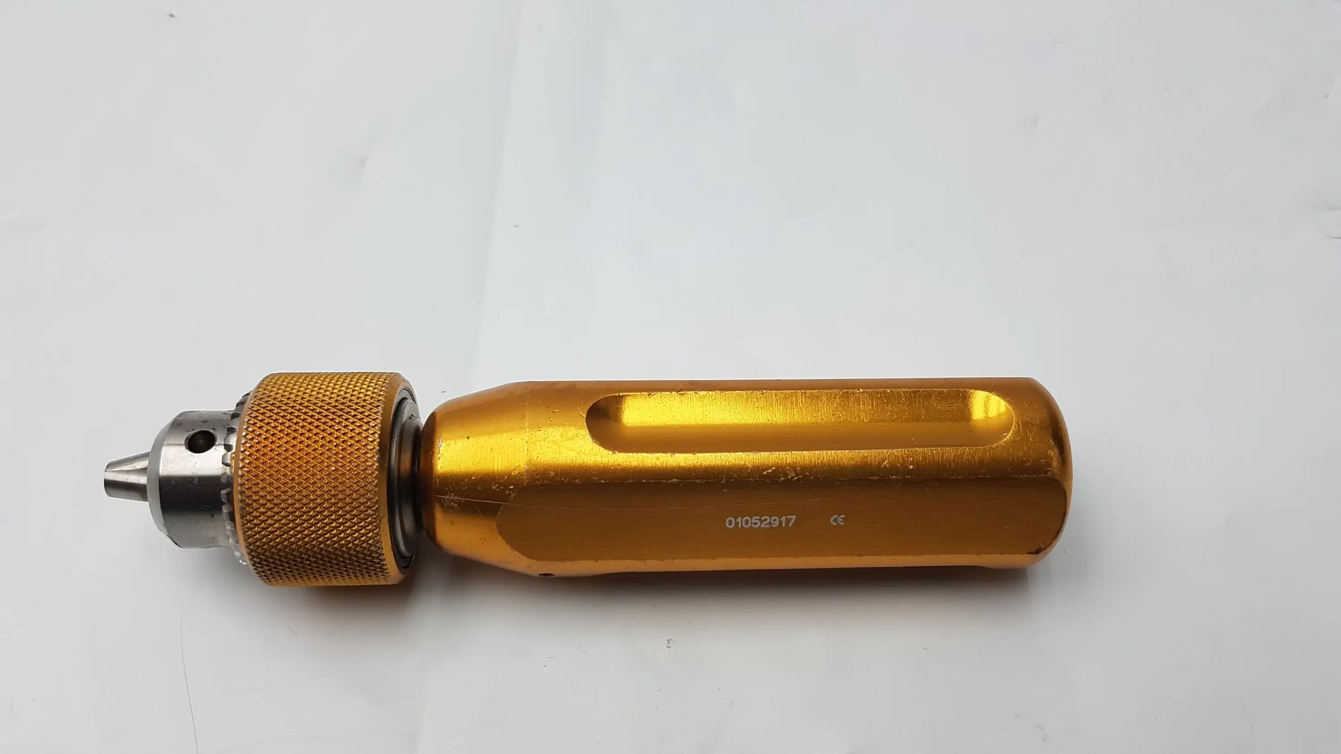 Arthrex ar-1415 gold aluminum tube driver extractor with textured grip and silver metallic tip for surgical use