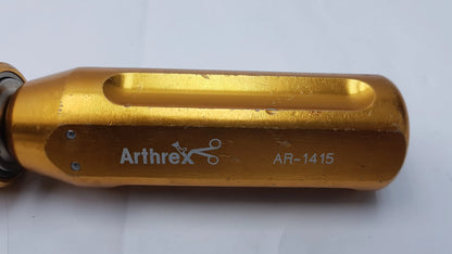 Gold-colored arthrex ar-1415 surgical orthopedic tube driver extractor with a sleek ergonomic design and engraved branding