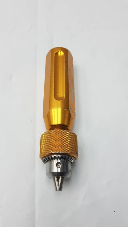 Arthrex AR-1415 gold-colored metal tube driver extractor with textured grip and silver-toned tip for surgical use