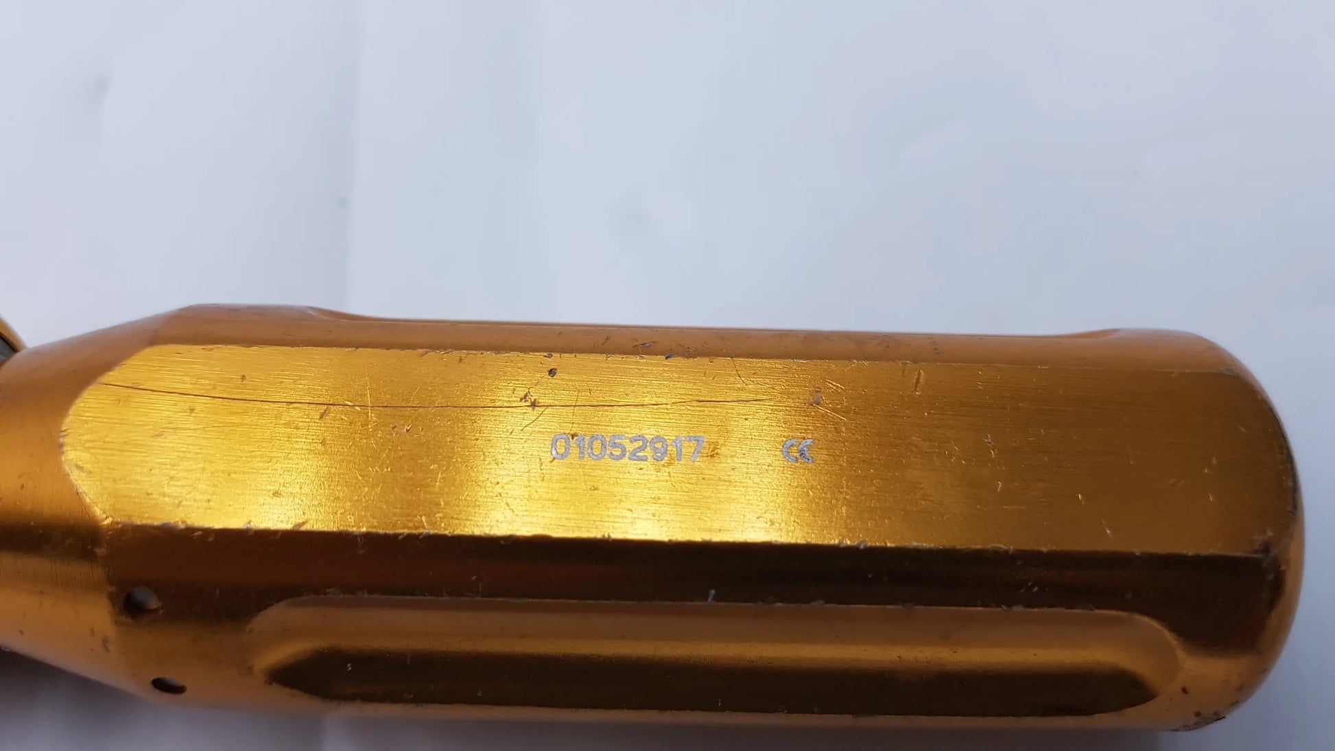 Arthrex ar-1415 surgical orthopedic tube driver extractor with a golden metallic brushed finish and engraved serial number