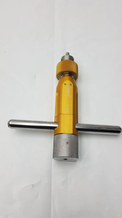 Yellow and silver Arthrex AR-1415T tube harvester driver extractor with knurled grip and dual handles featuring oats chuck handle