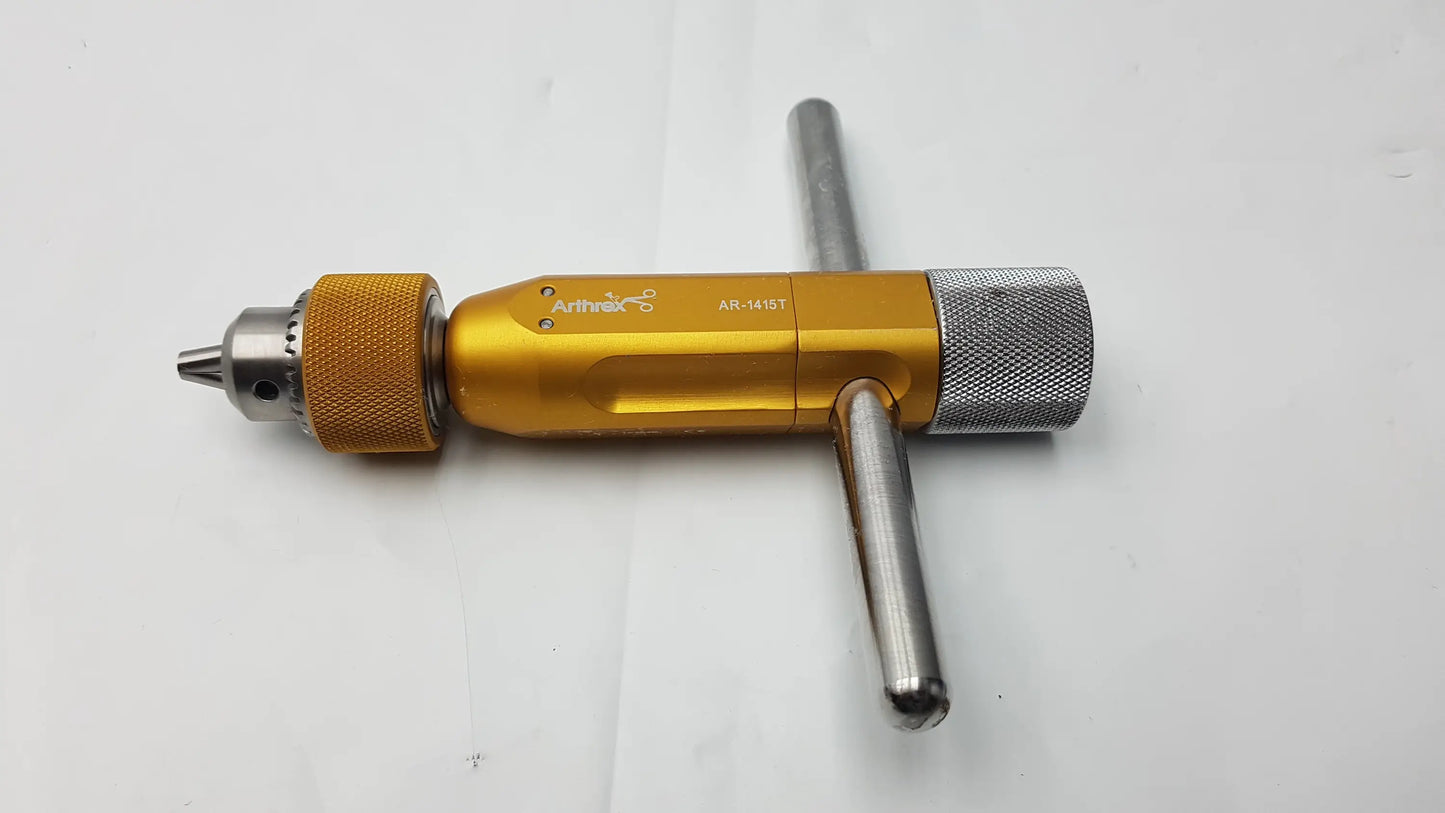 Gold-colored arthrex ar-1415t tube harvester driver extractor with oats chuck handle and textured silver metallic grip