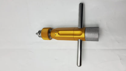 Gold-colored metal arthrex ar-1415t tube harvester driver extractor with silver oats chuck handle and textured grip