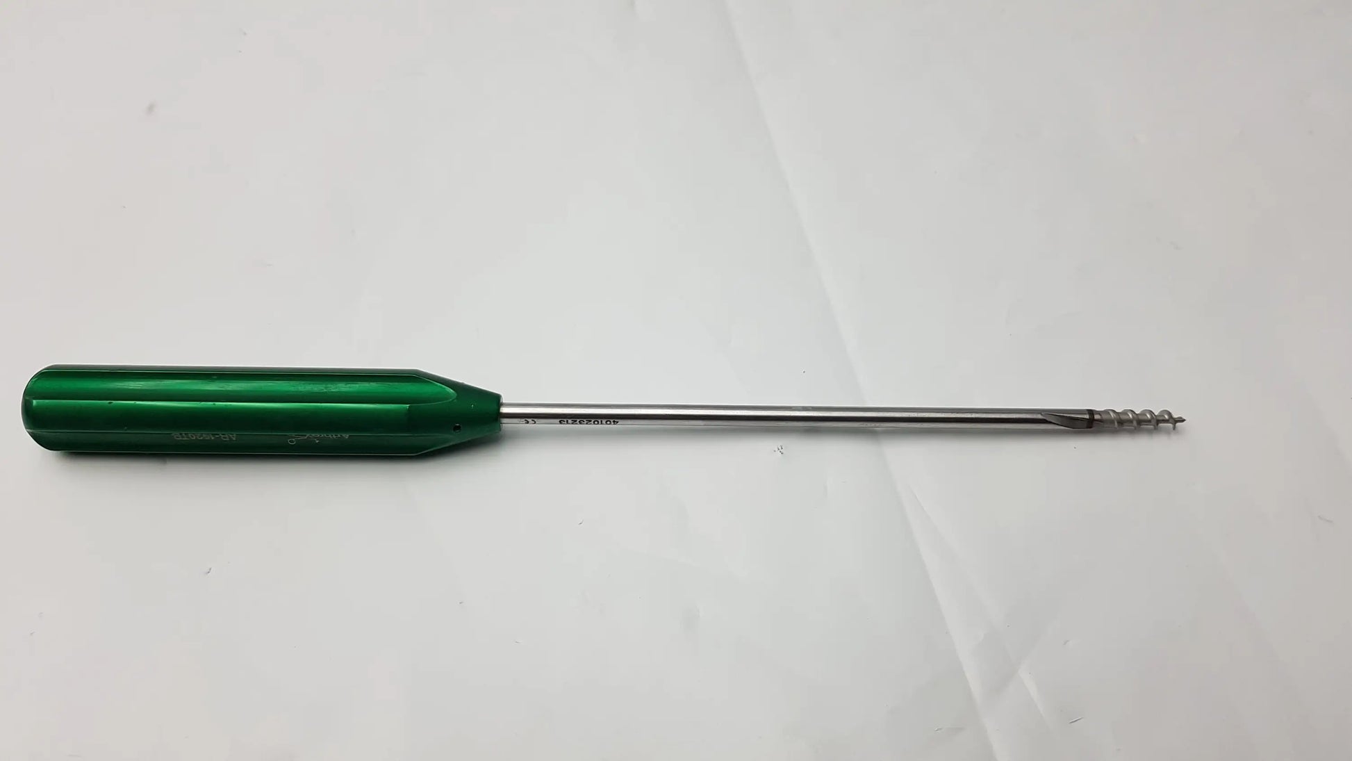 Green-handled arthrex ar-1920tb bio-corkscrew combo punch tap surgical instrument with metallic shaft and threaded tip
