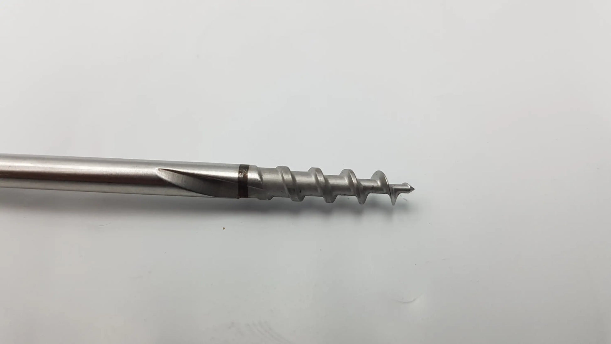 Arthrex ar-1920tb bio-corkscrew combo punch tap surgical instrument with metallic silver spiral drill bit and precise cutting edges