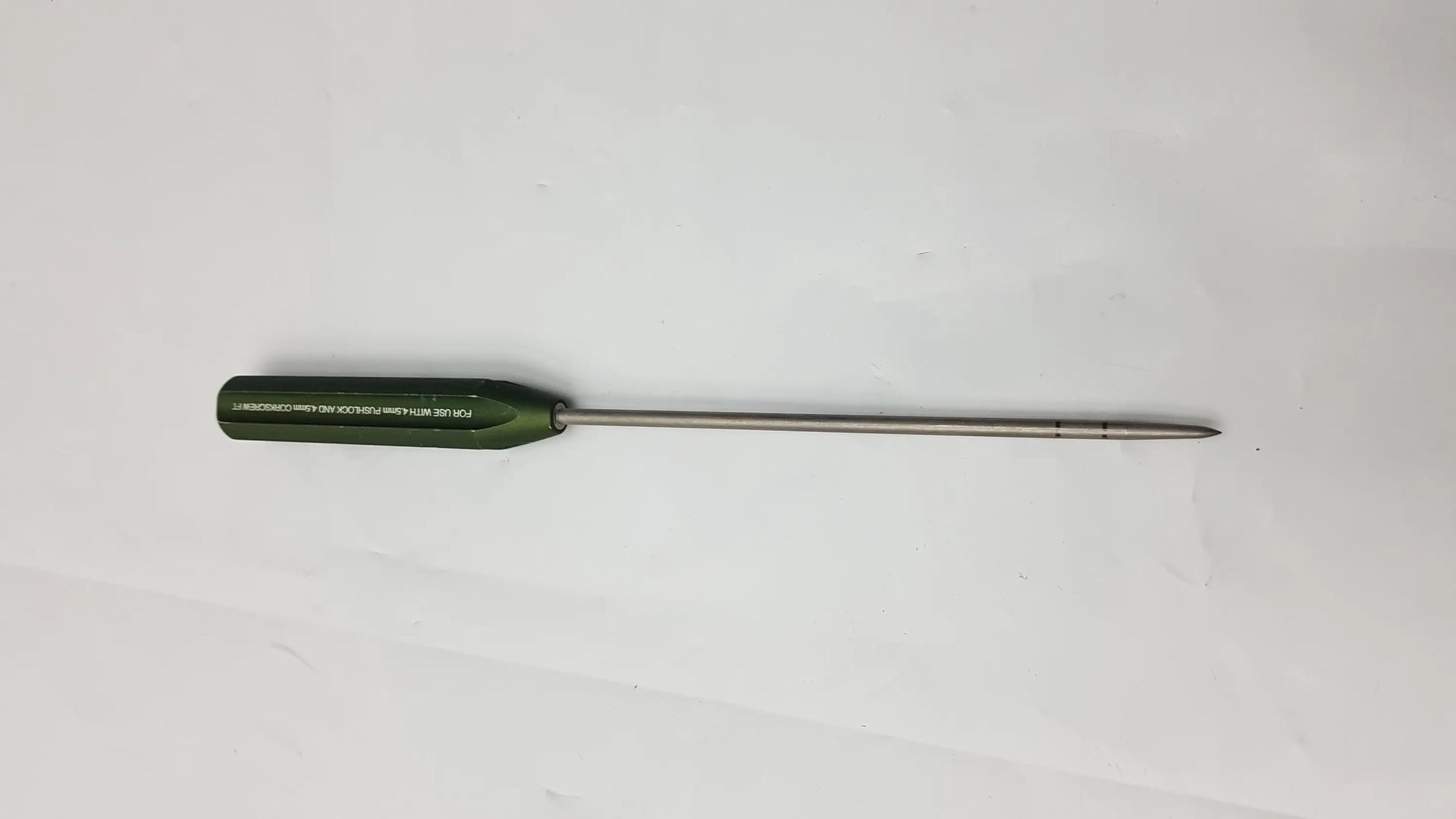 Green-handled ar-1922p surgical instrument with slender metallic shaft and pointed tip for corkscrew ft systems use