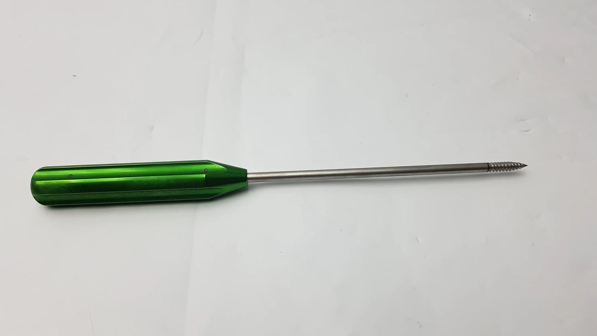 Green-handled metallic punch tap with threaded tip for arthrex swivelock anchor systems 4.75mm use