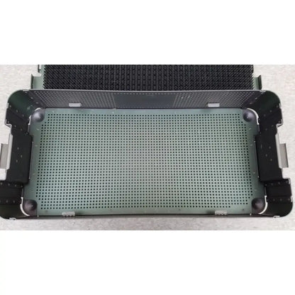 Green perforated metal sterilization tray with black reinforced corners and handles from ArthroCare AutoCuff OPUS collection