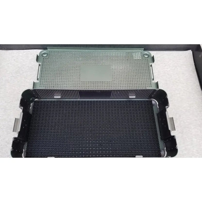 Black and olive green perforated plastic sterilization trays with reinforced metal edges from autocuff opus collection