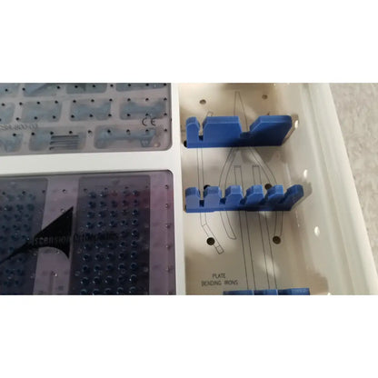 Blue plastic bending irons in a white tray from the ascension forefoot set ref csa-800-01 for surgical use
