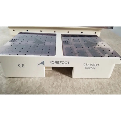 White plastic dental instrument tray with two perforated gray lids labeled forefoot set ref csa-800-01 ascension forefoot set