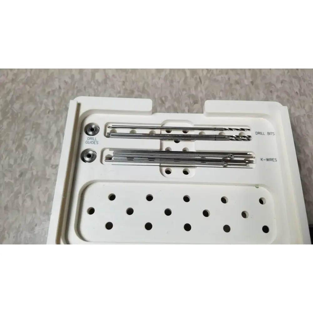 White plastic tray with organized surgical drill bits and k-wires in ascension forefoot set ref csa-800-01