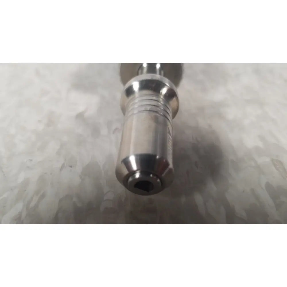 Shiny metallic dental implant with threaded shaft and rounded tip in ascension ref csa-5001-001 capture screws set