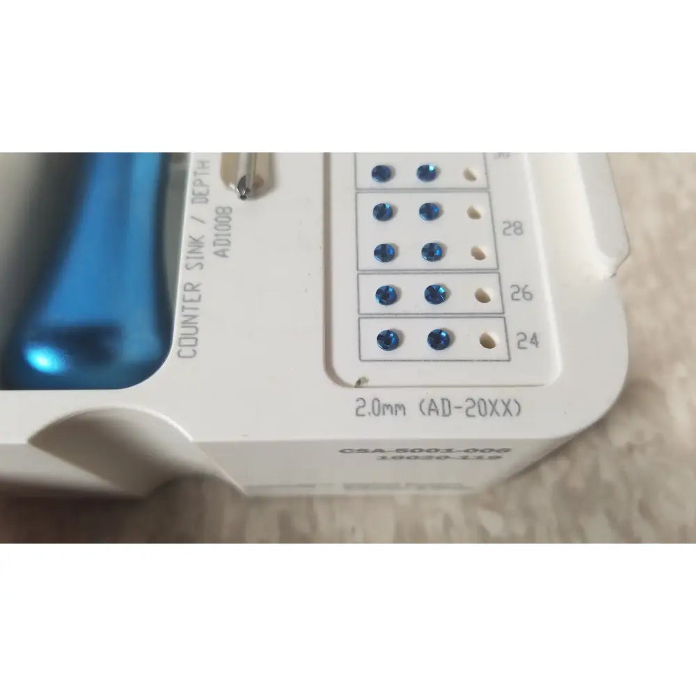 White plastic dental counter sink tool with blue gemstone markers and engraved depth for ascension ref csa-5001-001 capture screws
