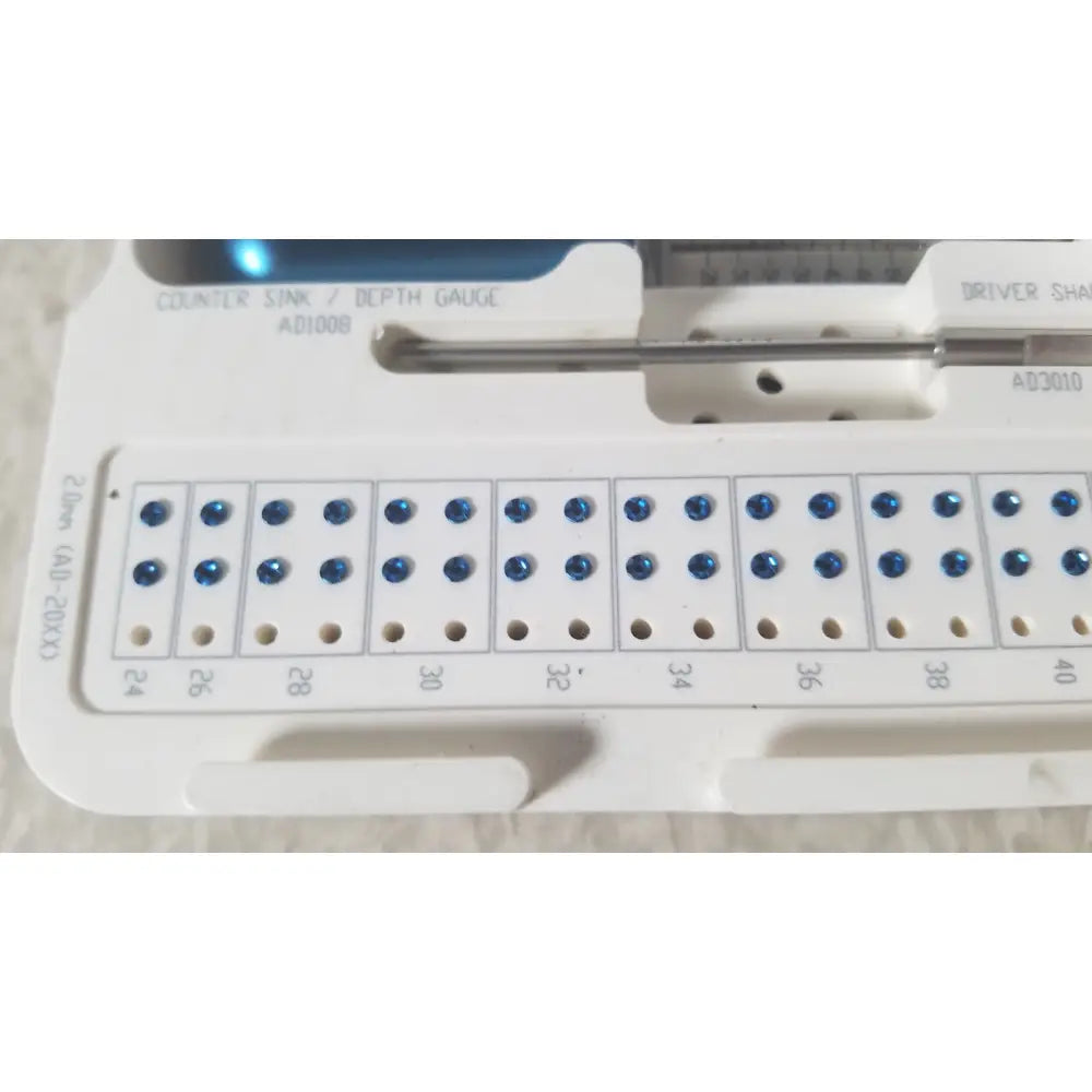 White plastic drill bit holder with blue-tipped bits sized 2 to 40 for ascension ref csa-5001-001 capture screws