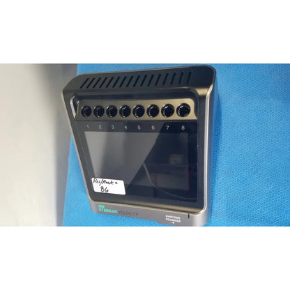 Asp sterrad velocity barcode scanner reader in black and silver with eight circular buttons above a touchscreen display