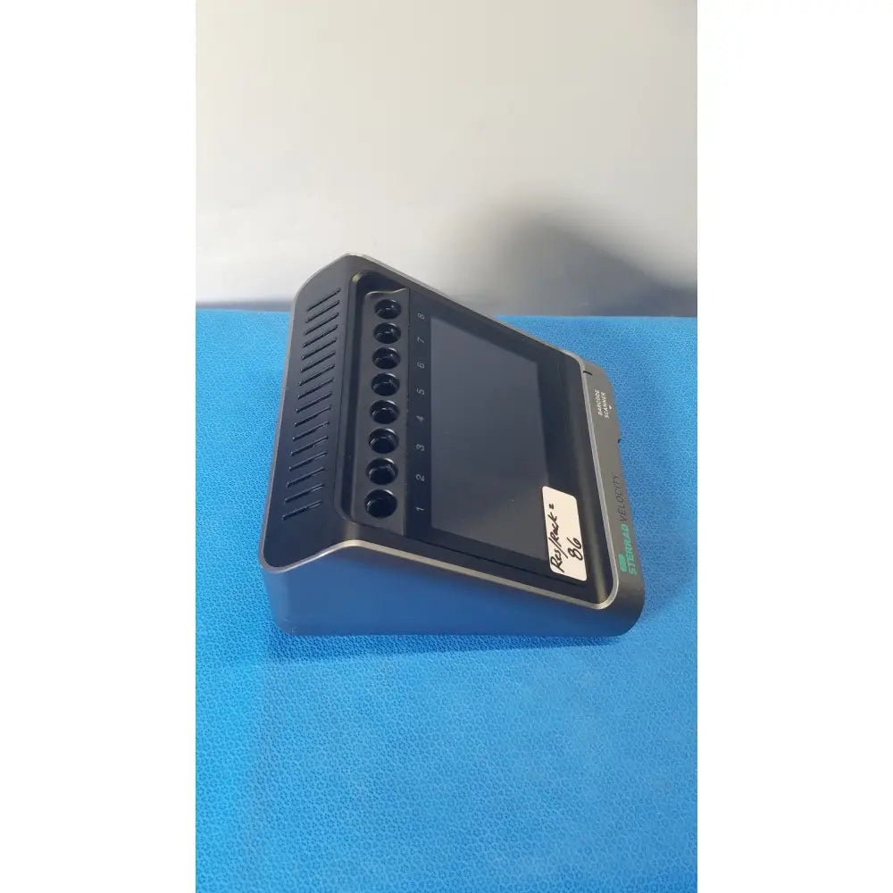 Black rectangular asp sterrad velocity barcode scanner reader with screen and numbered circular ports showing standard velocity logo