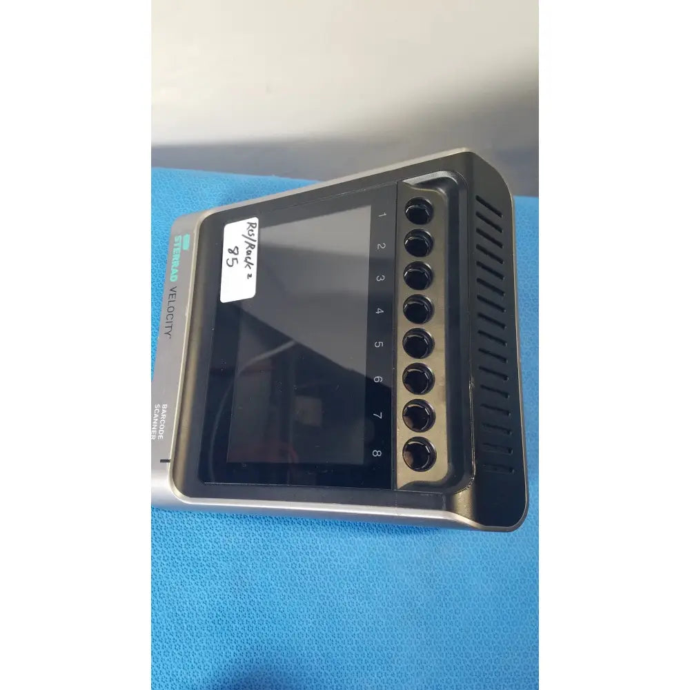 Black and silver sterilab velocity 8-channel blood analyzer with touchscreen display featuring asp sterrad velocity barcode scanner reader