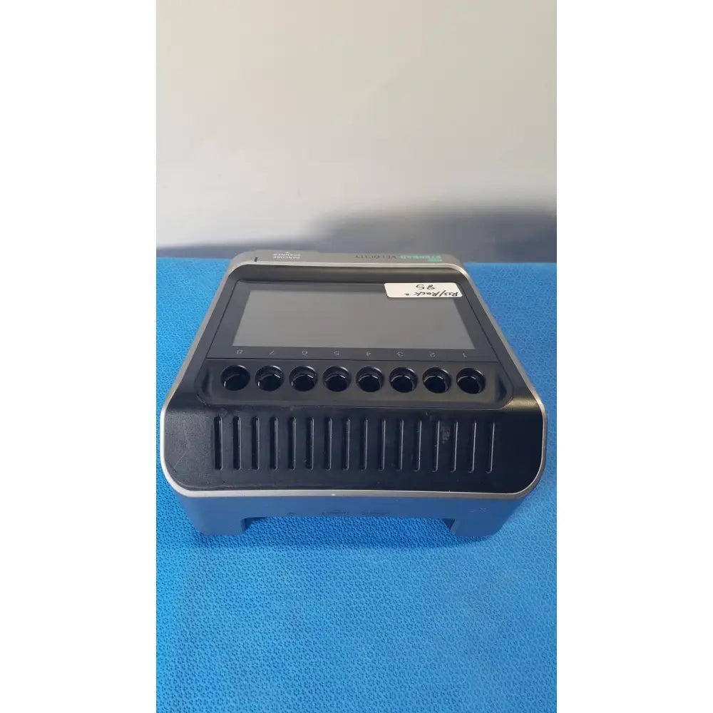Black and gray asp sterrad velocity barcode scanner with touchscreen, circular ports, and vertical ventilation slits