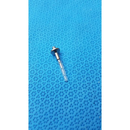 A transparent dental implant screw with metallic threaded head and shaft for assembly burr corenal rust ring removal
