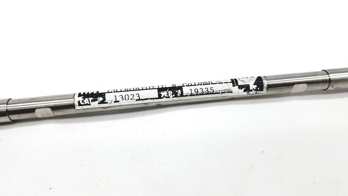 A metallic cylindrical astec chirobiotic r column cat 13023 label on a 4.6x150mm chiral hplc column shaft