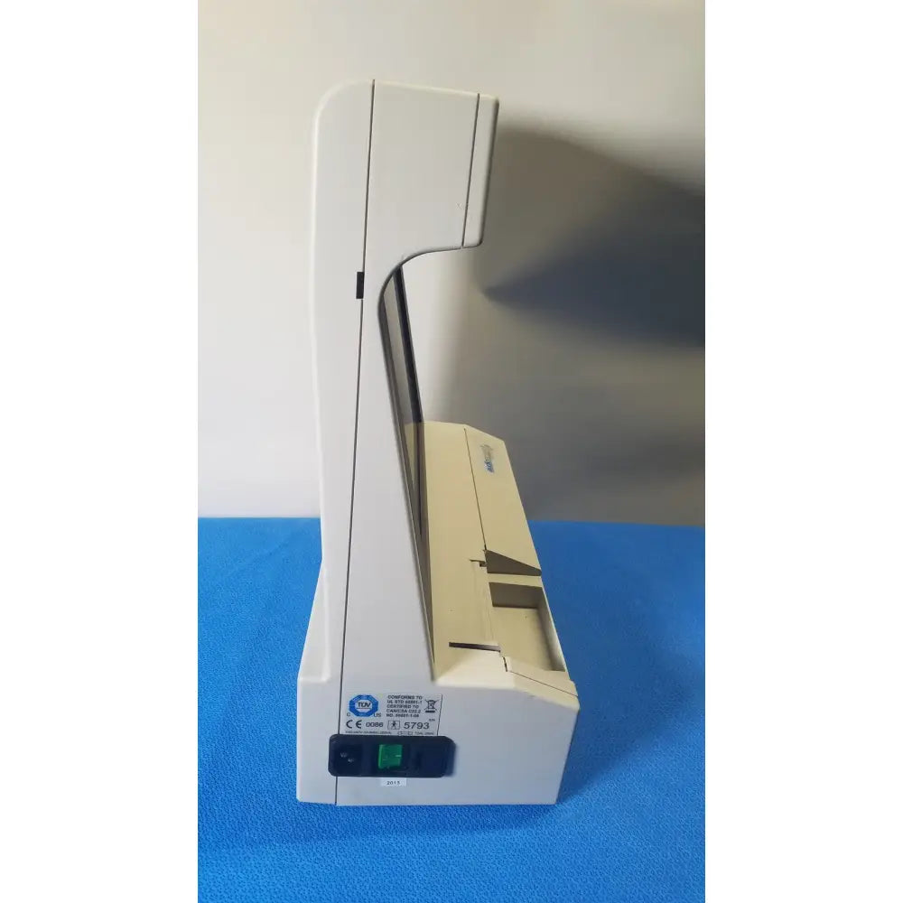 White plastic audioscan verifit vf-1 hearing analyzer with beige scanning tray and green power button for real-ear testing
