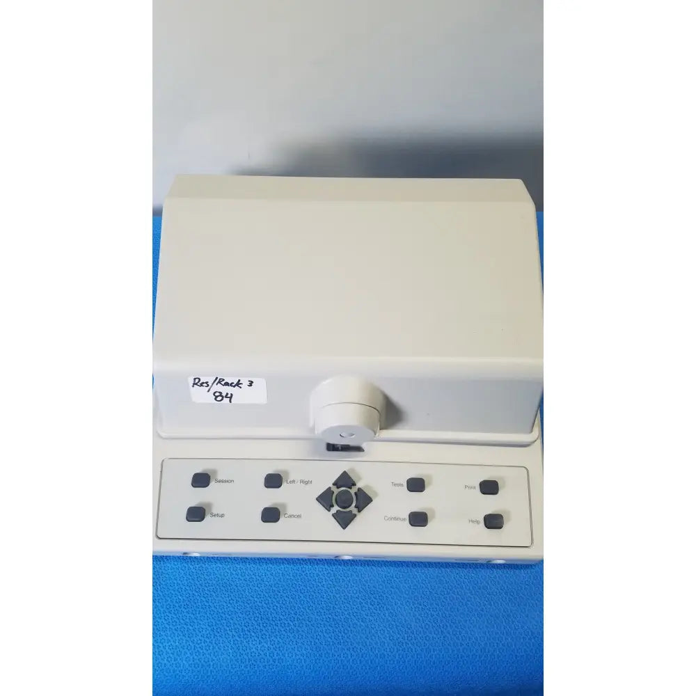 Cream-colored plastic audioscan verifit vf-1 hearing analyzer with control panel featuring black buttons and directional pad