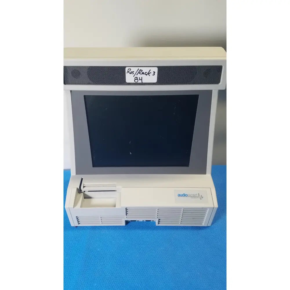 White plastic audioscan verifit vf-1 hearing analyzer with black screen and side ventilation grilles for real-ear testing